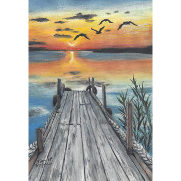 Dawn beach scene with dock, birds