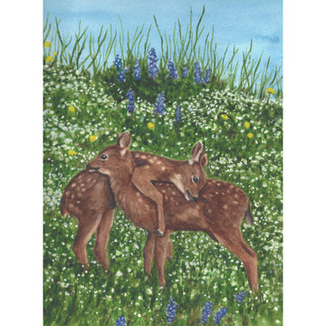 Deer in field of flowers